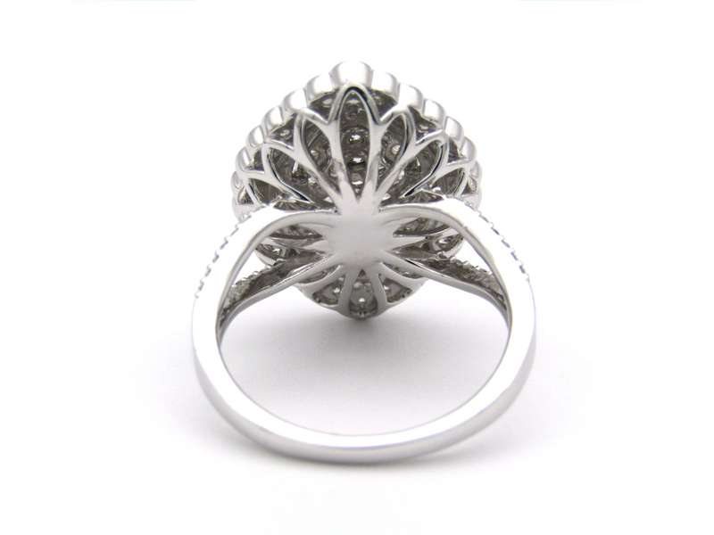 18K gold diamond cluster ring.