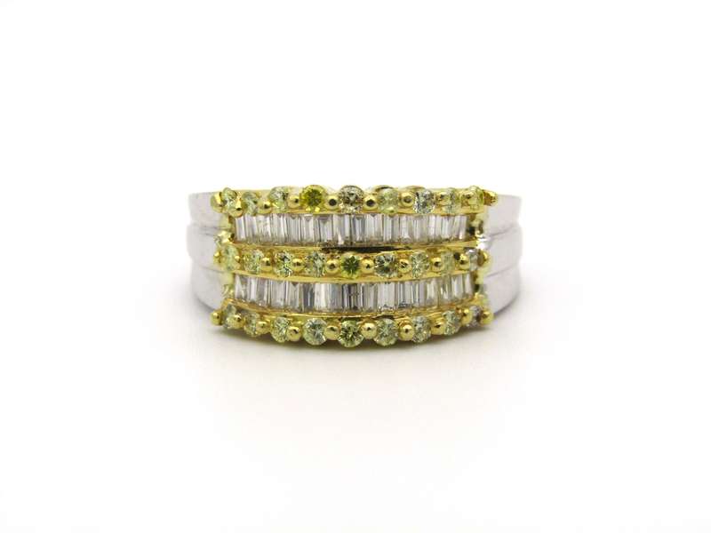 18K gold yellow and colourless diamond ring.