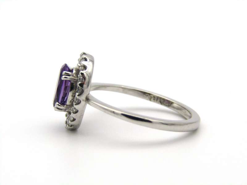 18K gold amethyst and diamond ring.
