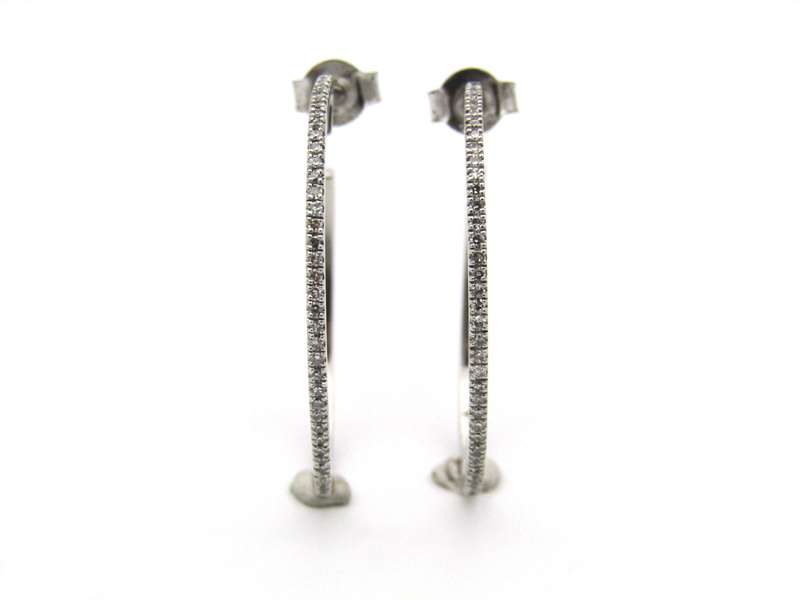 9K gold diamond hoop earrings.