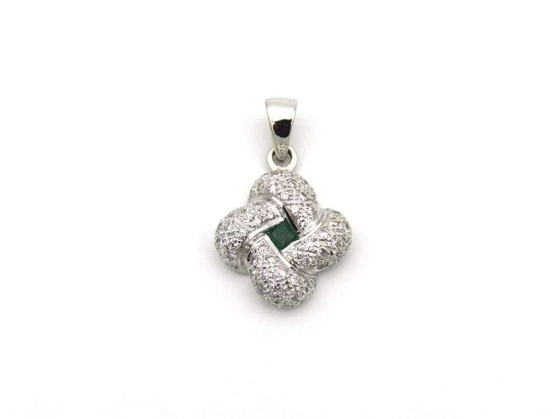18K gold emerald and diamond pendant.