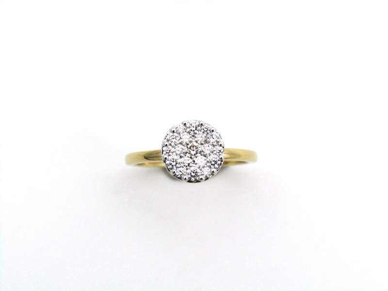 18K gold diamond cluster ring.