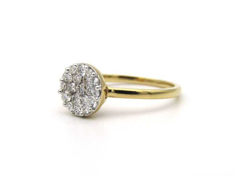 18K gold diamond cluster ring.