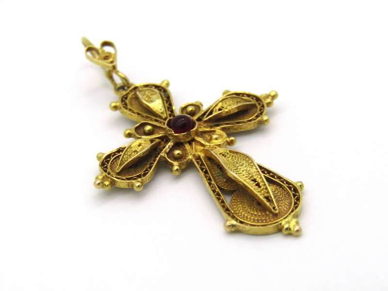 18kt gold filigree ruby cross, Circa 1940.