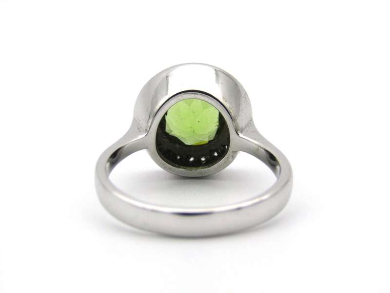 9K gold peridot and diamond ring.