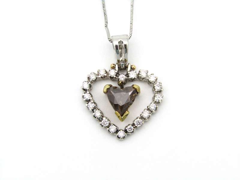 18K gold Champagne diamond pendant.