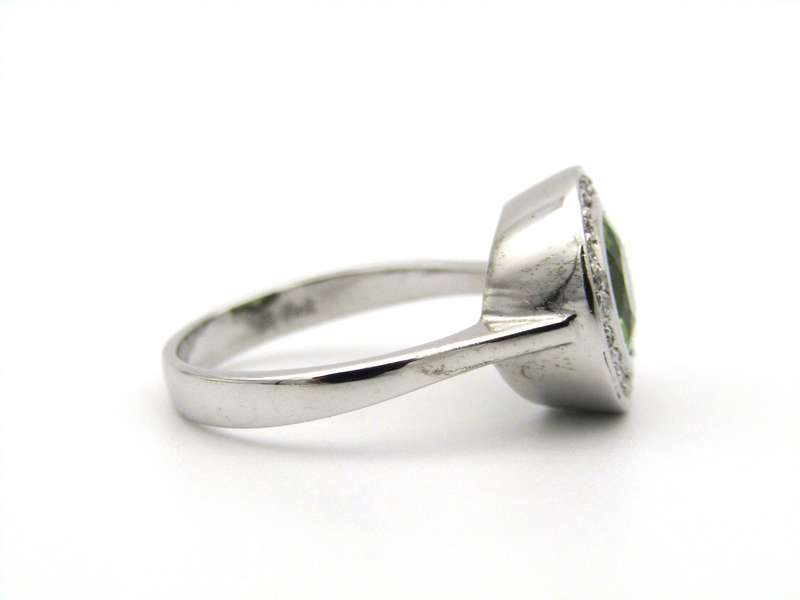 9K gold peridot and diamond ring.