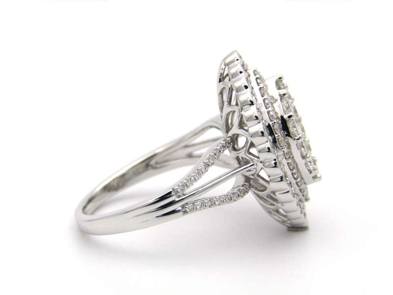 18K gold diamond cluster ring.