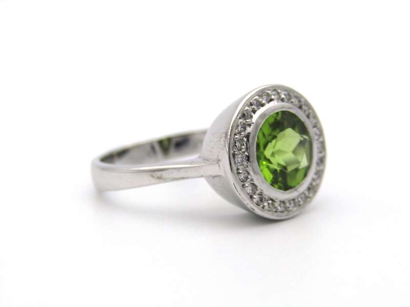 9K gold peridot and diamond ring.