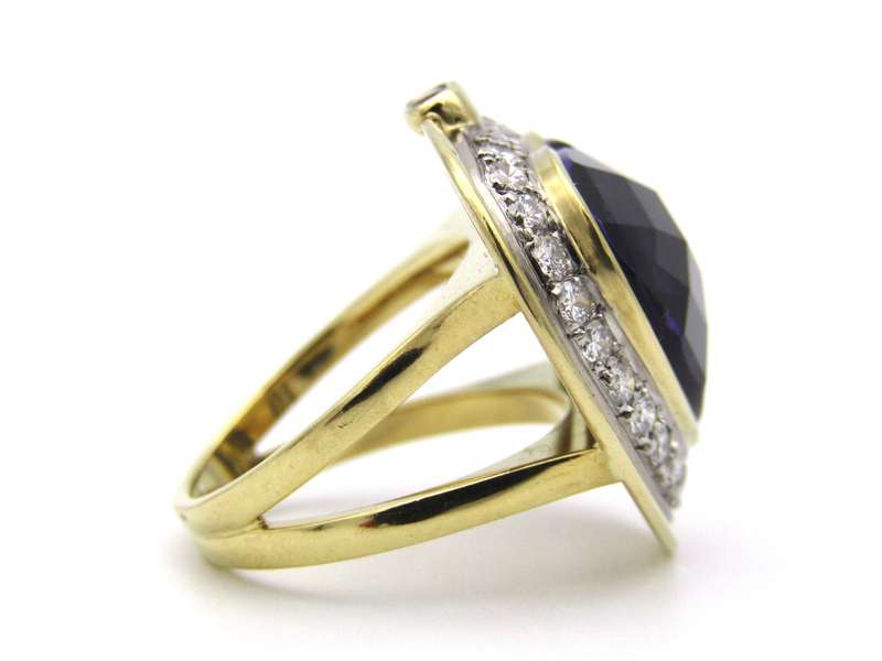 18K gold amethyst, diamond, and ruby ring.