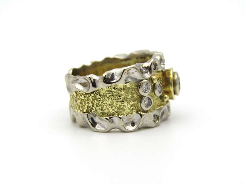 18K gold diamond ring.
