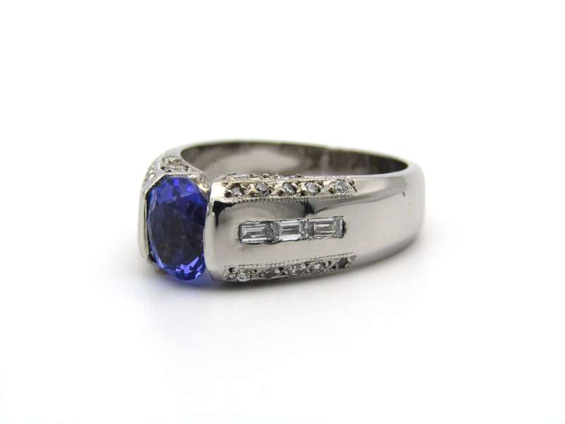 9K gold tanzanite and diamond ring.