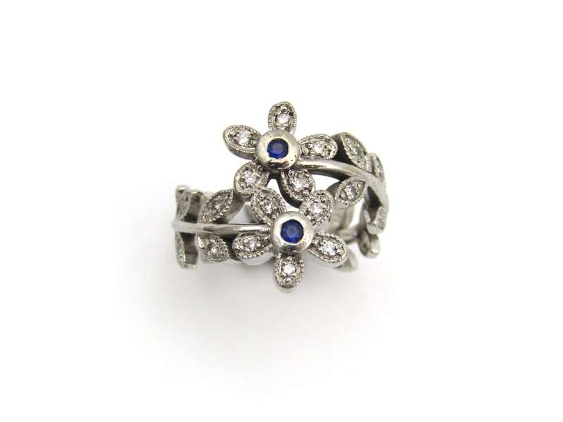 18K gold sapphire and diamond ring.
