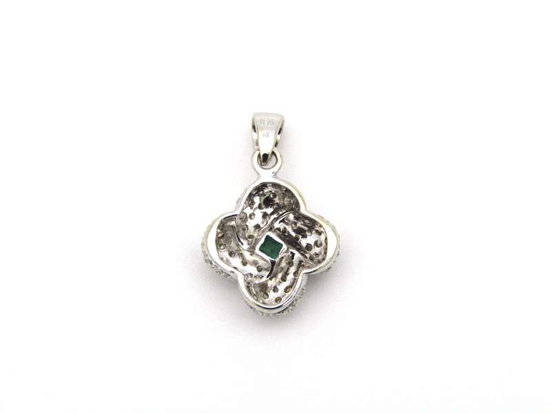 18K gold emerald and diamond pendant.