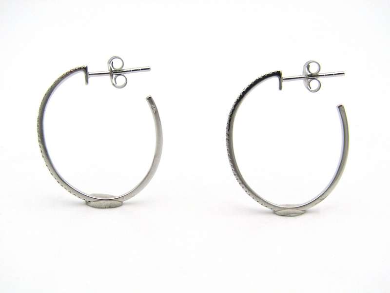 9K gold diamond hoop earrings.