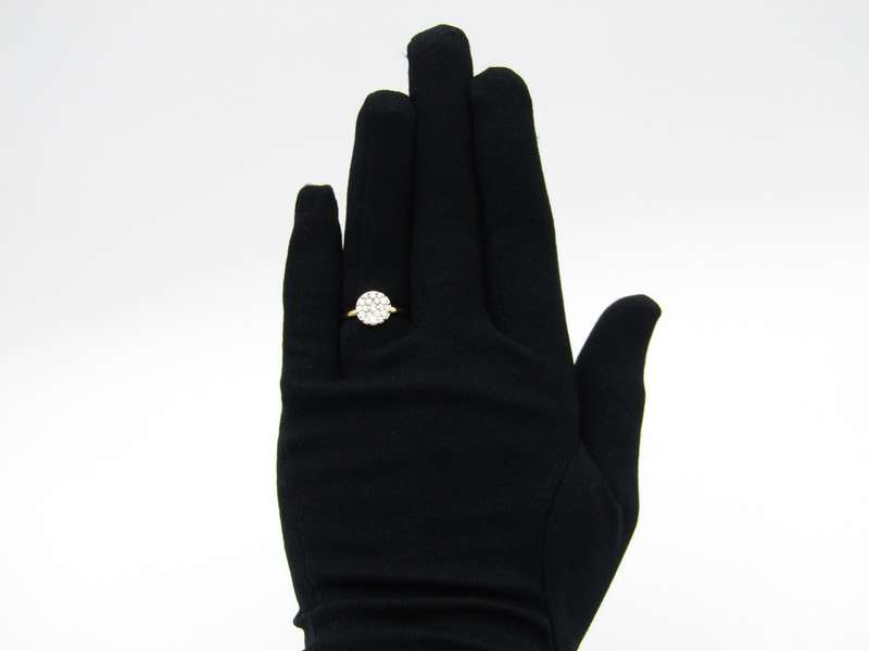 18K gold diamond cluster ring.