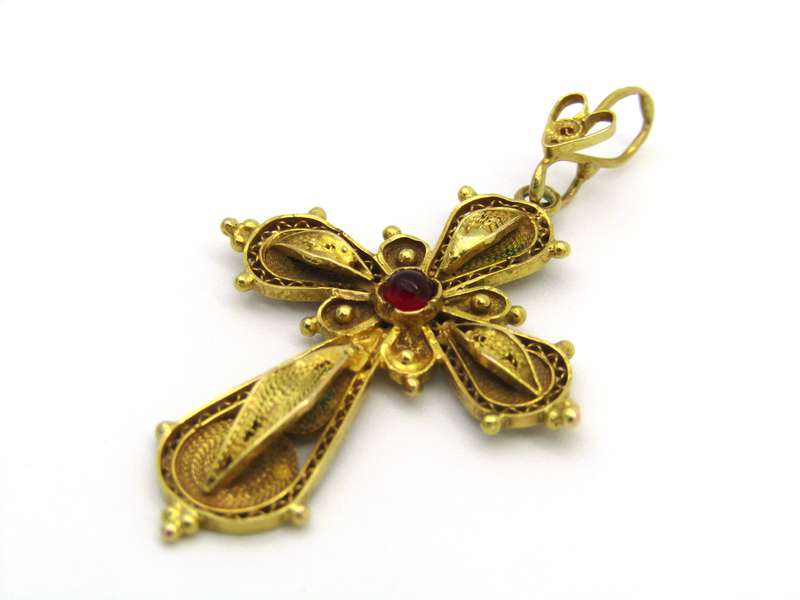 18kt gold filigree ruby cross, Circa 1940.