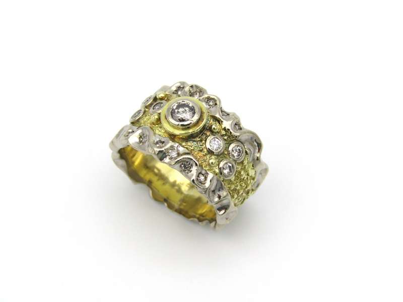 18K gold diamond ring.
