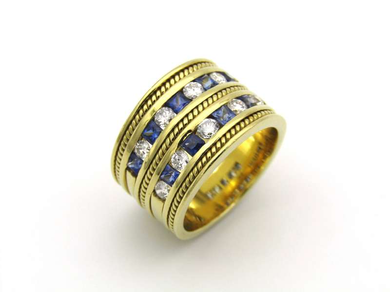 18K gold sapphire and diamond ring.