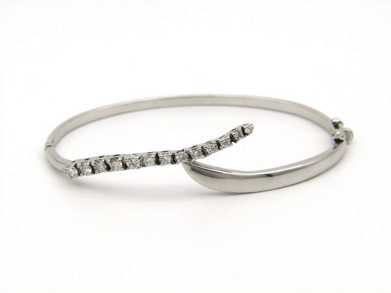 18K gold diamond bangle.