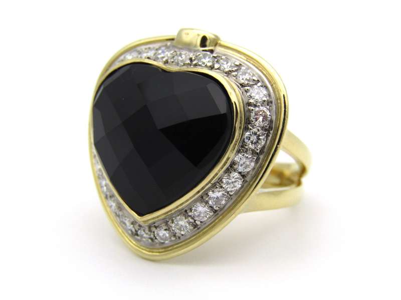 18K gold amethyst, diamond, and ruby ring.