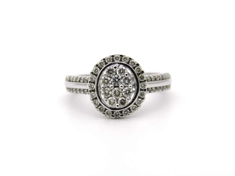 14K gold diamond ring.