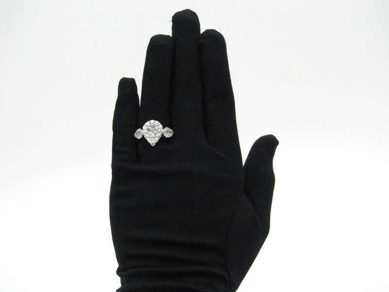 18K gold diamond cluster ring.