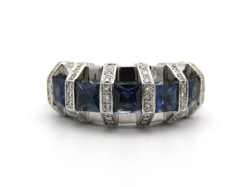 18K gold sapphire and diamond ring.