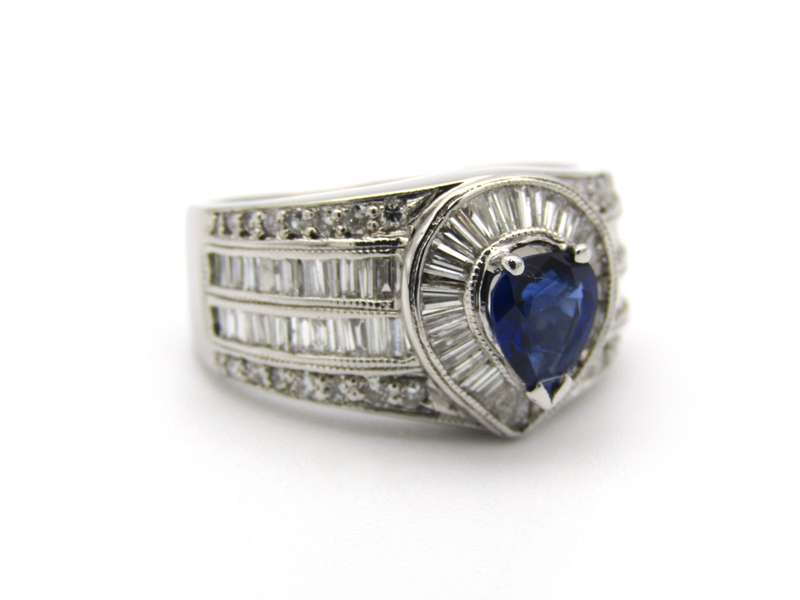 18K gold sapphire and diamond ring.
