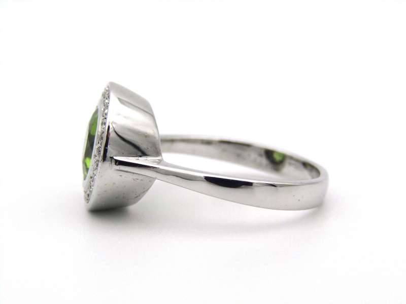 9K gold peridot and diamond ring.