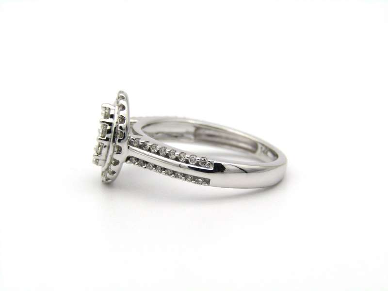 14K gold diamond ring.
