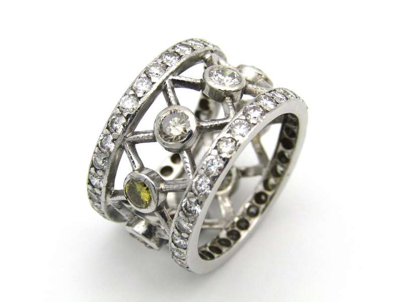 9K gold fancy-coloured and colourless diamond ring.