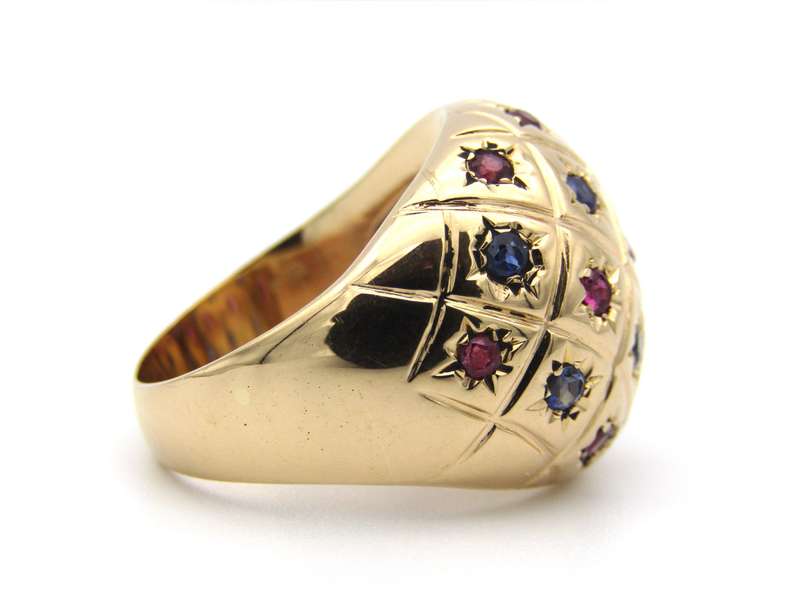 18K gold ruby and sapphire bombe ring.