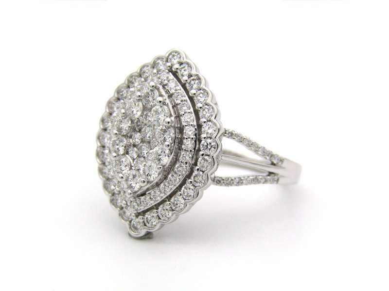 18K gold diamond cluster ring.
