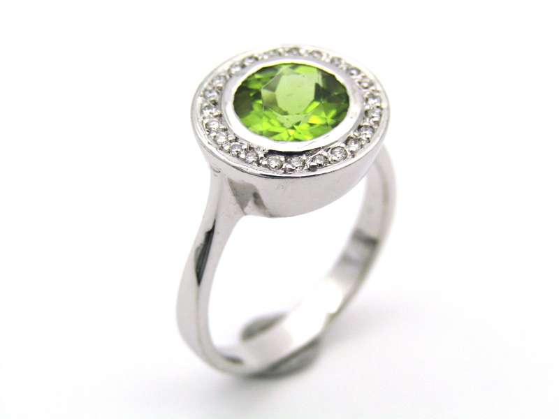 9K gold peridot and diamond ring.