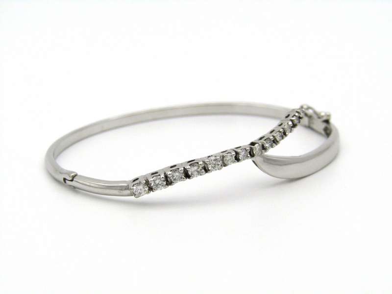 18K gold diamond bangle.