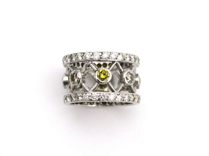 9K gold fancy-coloured and colourless diamond ring.