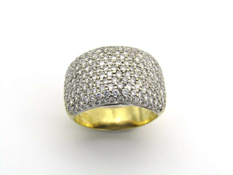 18K gold diamond dress ring by Jenna Clifford.