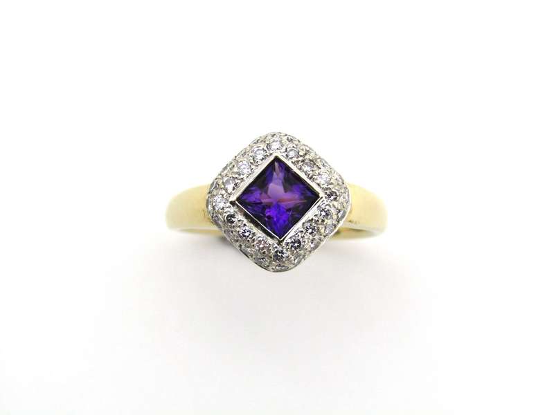 18K gold amethyst and diamond ring.
