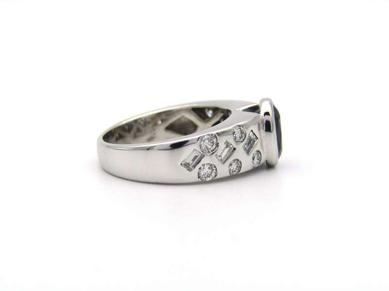 18K gold sapphire and diamond ring.