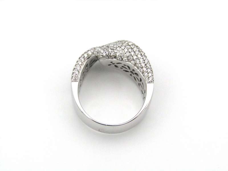 18K gold diamond twist ring.