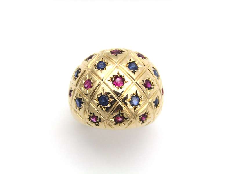 18K gold ruby and sapphire bombe ring.