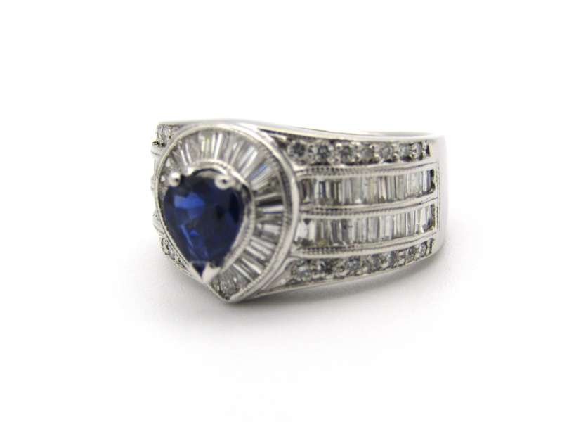 18K gold sapphire and diamond ring.