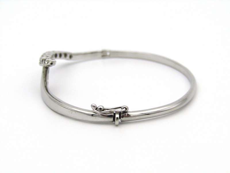18K gold diamond bangle.