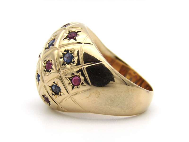 18K gold ruby and sapphire bombe ring.