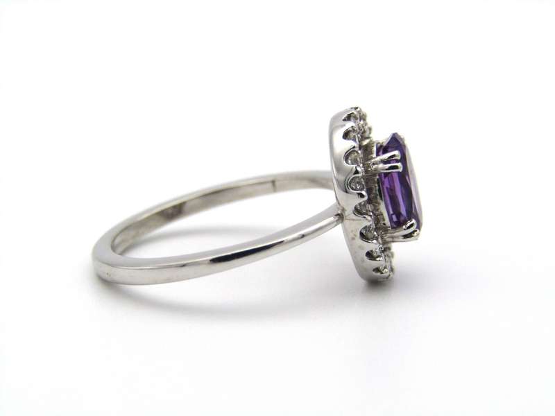 18K gold amethyst and diamond ring.