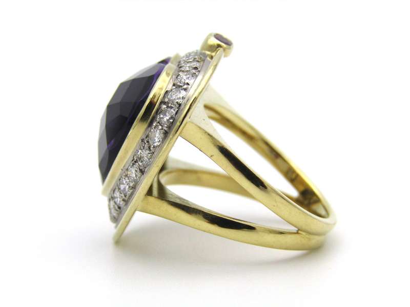 18K gold amethyst, diamond, and ruby ring.