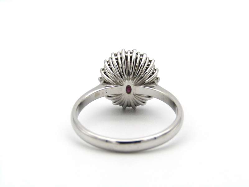 14K gold rubellite and diamond ring.