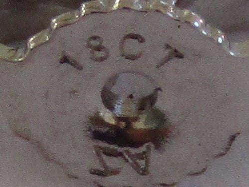 A pair of 18kt gold diamond stud earrings