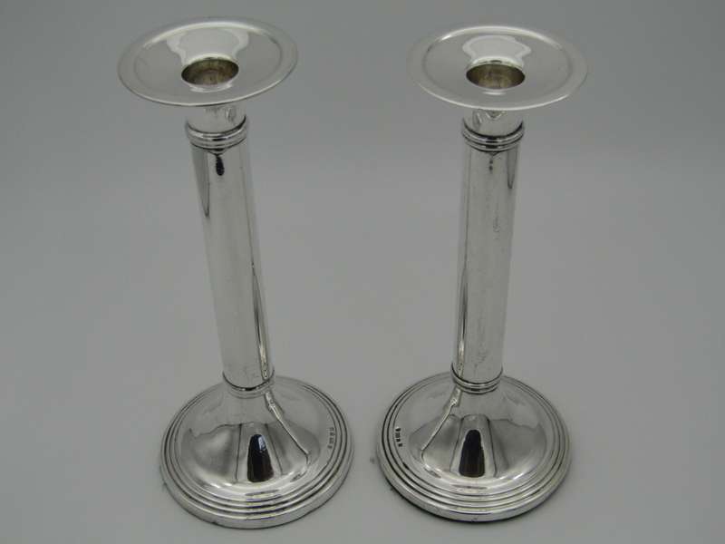 Pair of South African sterling silver candlesticks, made in 1994.